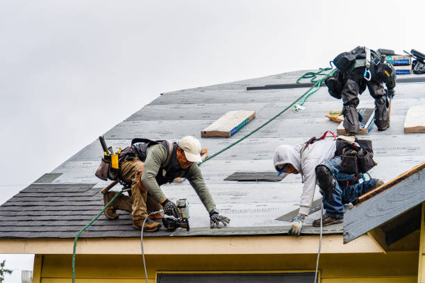 Professional Gutter Installation technician working in Belmont, CA